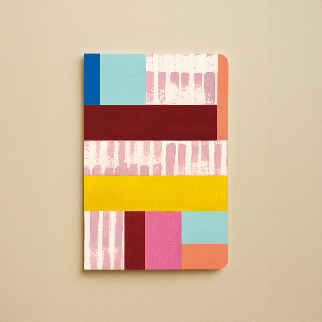 Carnet A5 Mondrian, couverture à aplats géométriques bleus, rouges, jaunes et roses