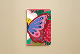 Carnet Papillon du trio Animaux colorés, couverture illustrée d'un grand papillon bleu sur des fleurs rouges