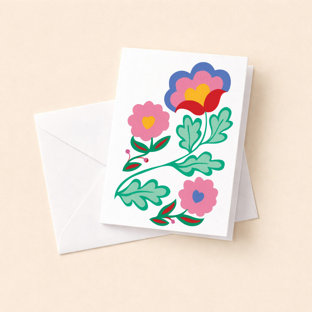 Mini carte pliée Fête en fleur et son enveloppe, grande fleur stylisée bleue et rose sur fond blanc