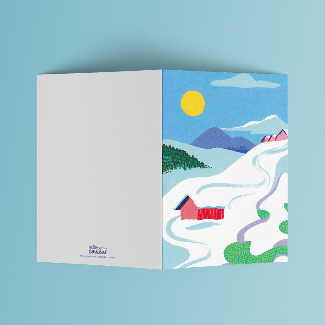 Carte pliée La montagne de Stéphanie dépliée, page intérieure vierge à gauche et paysage enneigé à droite