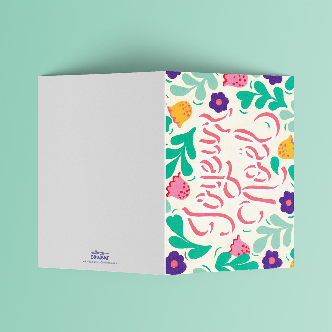 Carte pliée Joyeux Noël dépliée, page intérieure vierge à gauche et message calligraphié à droite