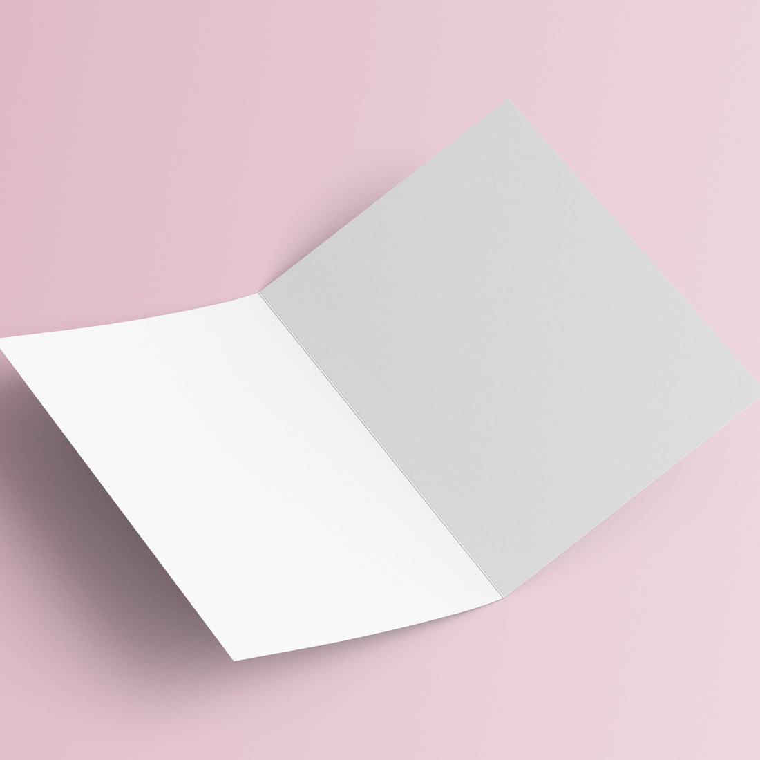 Carte pliée Piano Fleuri dépliée, montrant ses deux pages intérieures blanches