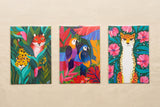 Pack sauvage présenté à plat : trois illustrations tropicales, félins et perroquets